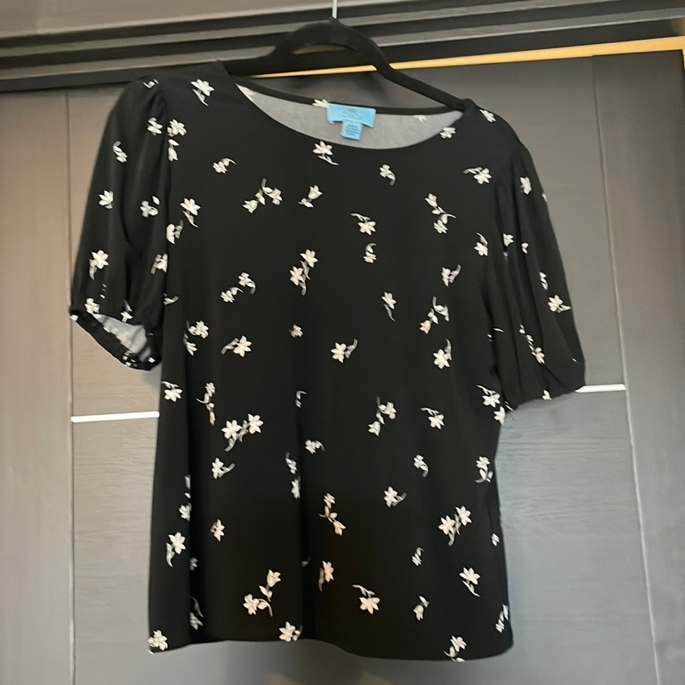 Floral shirt.